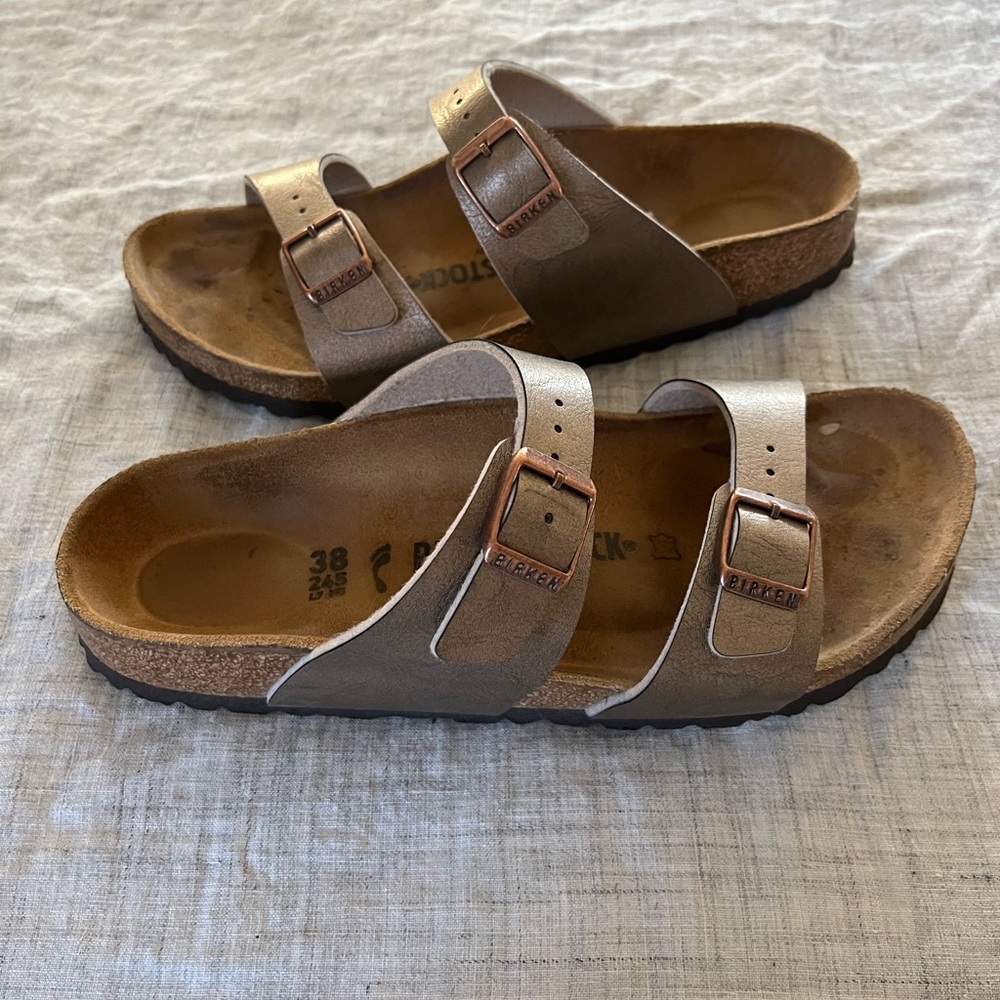 Birkenstock Arizona size 38, metallic gold, great condition.